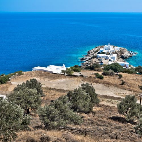 A little peninsula with the church of Chrisopigi on the island of Sifnos in Greece