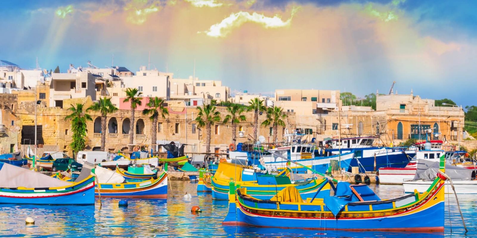 https://www.talamare.fr/medias/Des bateaux colors dans l'ancien village de pcheurs de Marsaxlokk sur l'le de Malte